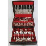 A canteen of silver plated cutlery, twelve settings, inc carving set and serving spoons,