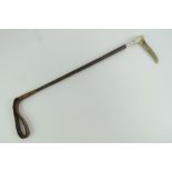 A fine Victorian HM silver collared horn handled and melacca riding crop with leather tail