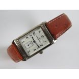 A c1990s Jaeger Le Coultre stainless steel Reverso quartz wristwatch,