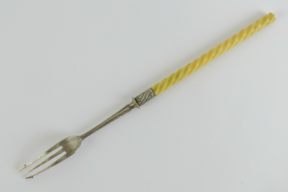 A pickle fork having twist carved ivory handle and white metal fittings, 23cm in length. - Image 2 of 3