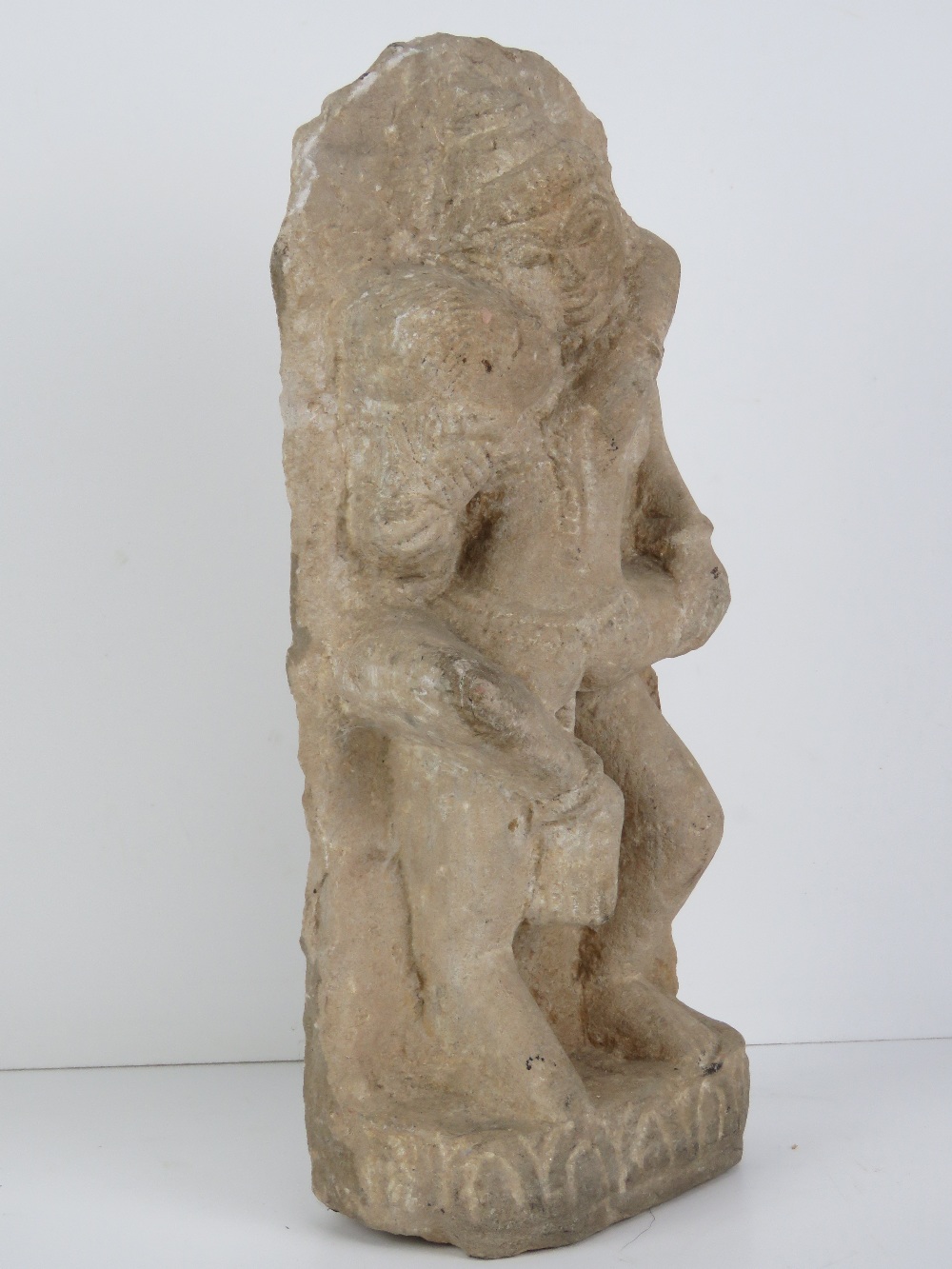 A hand carved stone figurine of Indo Asian erotic influence showing the union between man and woman, - Image 2 of 4