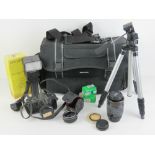A vintage Pentax P30T camera with camera accessories and bag, including Soligor 42 D dedicated TTL,