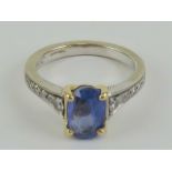 An 18ct gold oval cut cornflower blue sapphire ring, sapphire approx 1.3ct, (measuring 8.8 x 5.