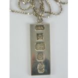 A HM silver ingot necklace having silver jubilee hallmarks to front upon 925 silver box link chain,