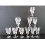 A set of six Edinburgh Crystal cut glass stem glasses standing 14cm high,