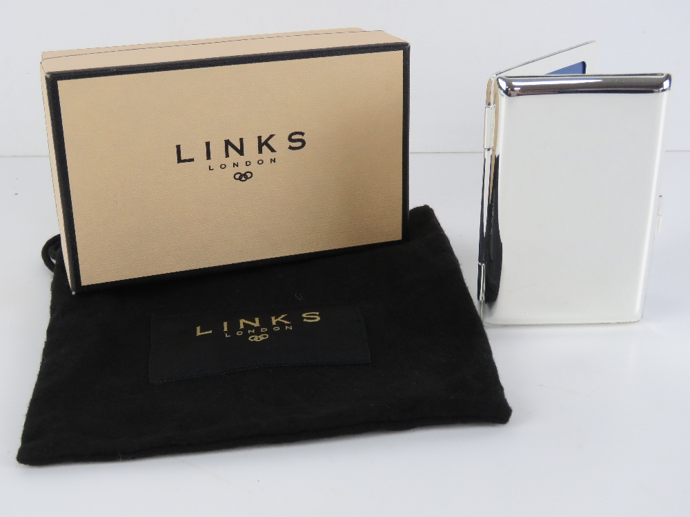 Links of London; a silver plated compact style photograph frame for two 9 x 4.