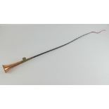 A highly unusual hunting horn whip, the side blown copper horn to the upper section,