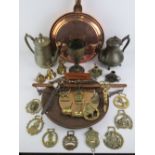 A quantity of assorted brass and copperware inc bedpan, candlewick trimmers, hanging balance scales,