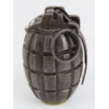 An inert Mills No5 Mk1 grenade, dated 19
