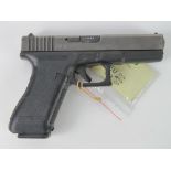 A deactivated Glock 17 9mm pistol, with