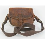 A vintage leather cartridge bag with sho