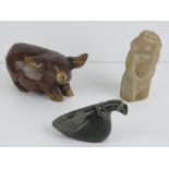 A carved stone pig figurine, 14cm in len