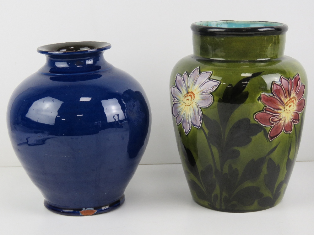 Two pottery vases; blue vase marked C H