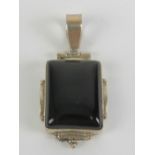 A 925 silver and square shaped onyx pend