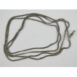 A long white metal guard chain having cl