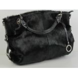 Edina Ronay; a black cowhide handbag approx 12 1/2" deep, 15 1/2" wide.