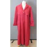 Ladies red trench coat, 35% cotton, bearing dry clean only label, UK size 14.