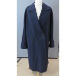 A navy blue wool blend 1980s men's coat, label removed.