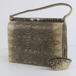 A vintage snake skin ladies handbag complete with python skin coin purse, 28cm wide.