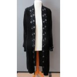 A three quarter length black velvet ladies jacket by Nicholas Courtney having sequined collar and