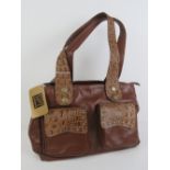 A brown leather and 'crocodile skin' ladies handbag by Anandra. Approx 9" high x 11" wide.