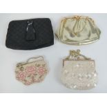 Two vintage ladies beaded evening bags together with two other evening bags. Four items.