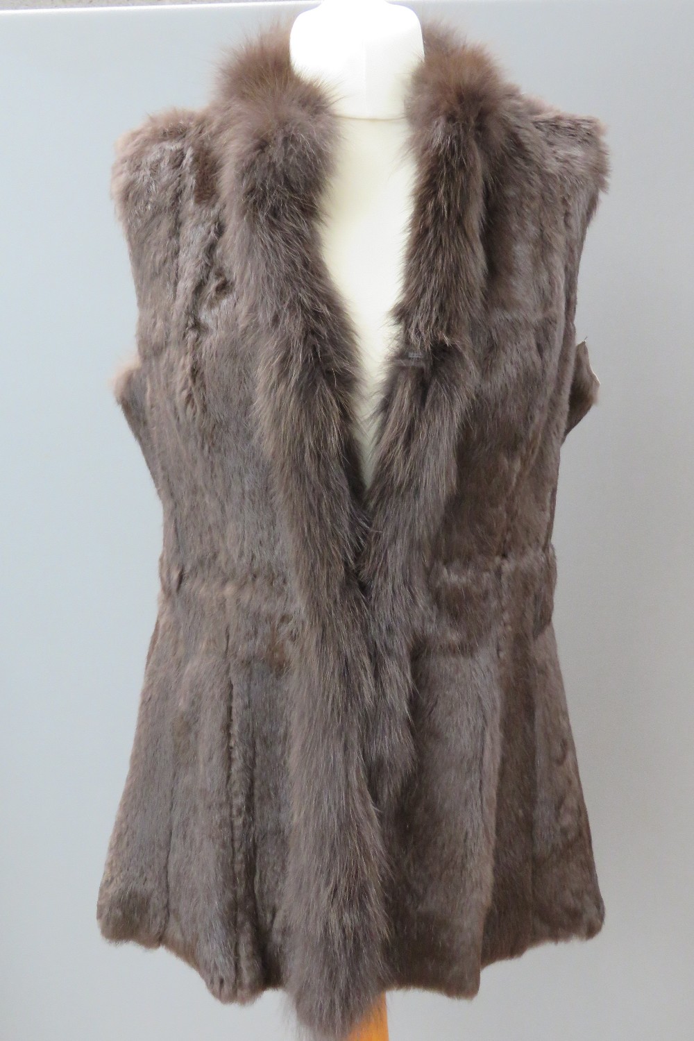 A vintage fur gilet. Approx measurements; 40" chest, 37" waist, 31" length at back inc collar.