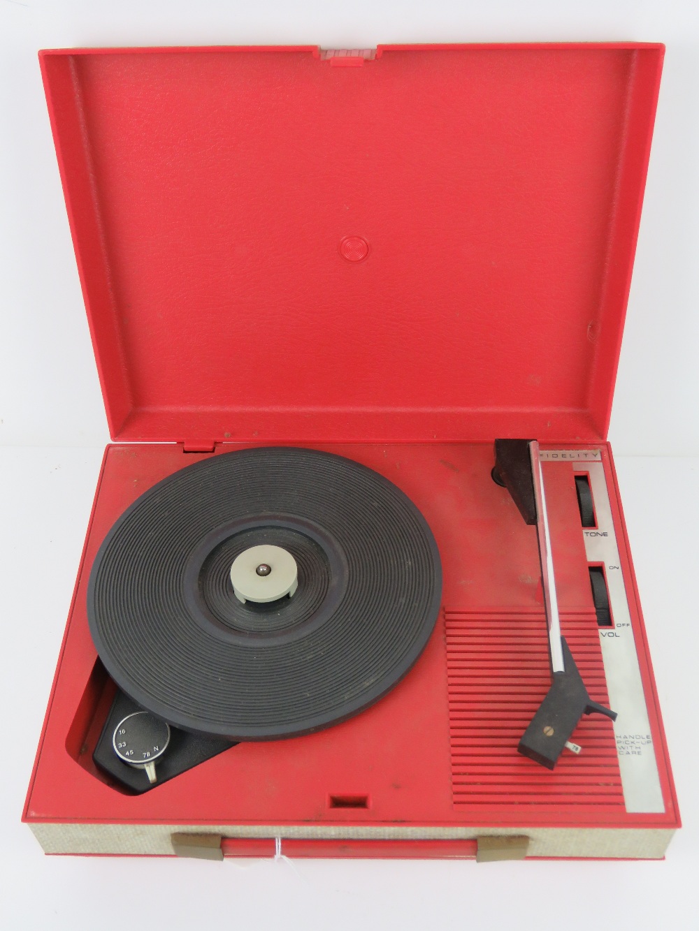 A Fidelity portable record player.