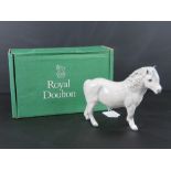 Royal Doulton dapple grey Shetland Pony, 14cm high, with associated Royal Doulton box.