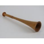 A turned wooden hunting horn, 9" in length.