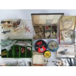 A quantity of assorted vintage sea, course and fly fishing gear including; flies, fly tins, hooks,