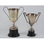 Two silver plated trophy cups,