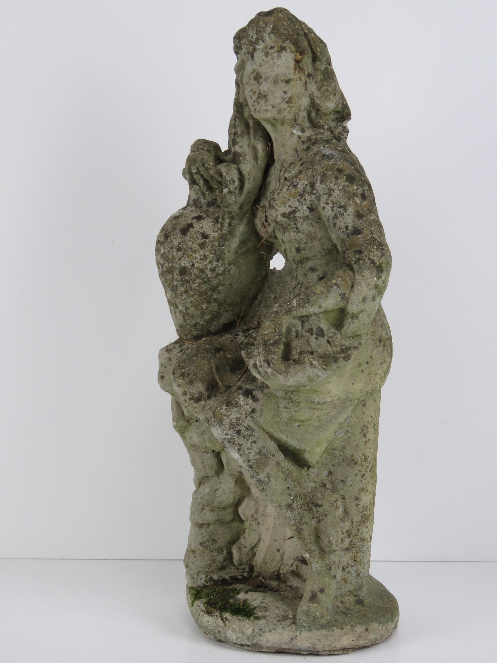 A precast stone garden ornament figurine 47cm high. Seated female with urn. - Image 2 of 3