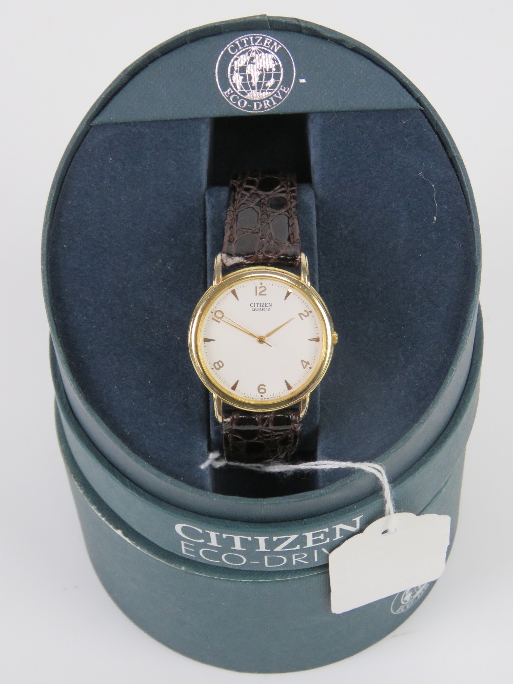 A Citizen quartz wristwatch having leather faux crocodile skin strap, in associated box.