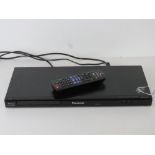 A Panasonic Blu-Ray player with remote.