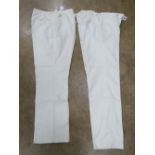 Two pairs of white sporting trousers; Ken Barrington 34 waist 31 leg, and Bukta.