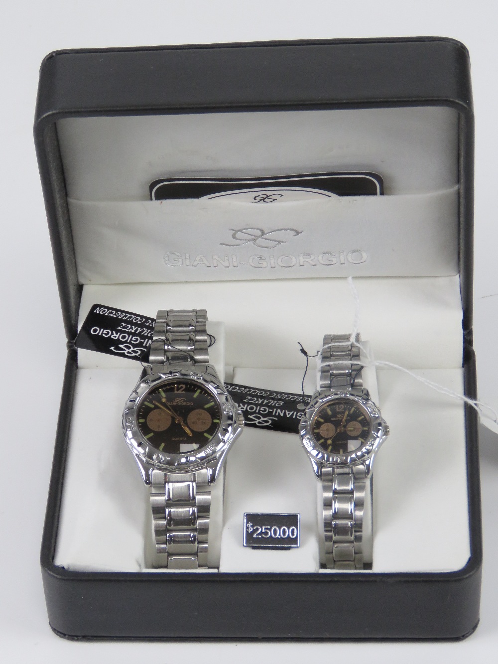 A 'His and Hers' stainless steel gents wristwatch and ladies wristwatch set, in presentation box.