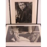 A pair of framed black and white photographic prints being Marilyn Monroe 59 x 79cm and James Dean