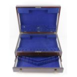 A two tier mahogany flatware box having lid opening to reveal fitted compartment with drawer under,