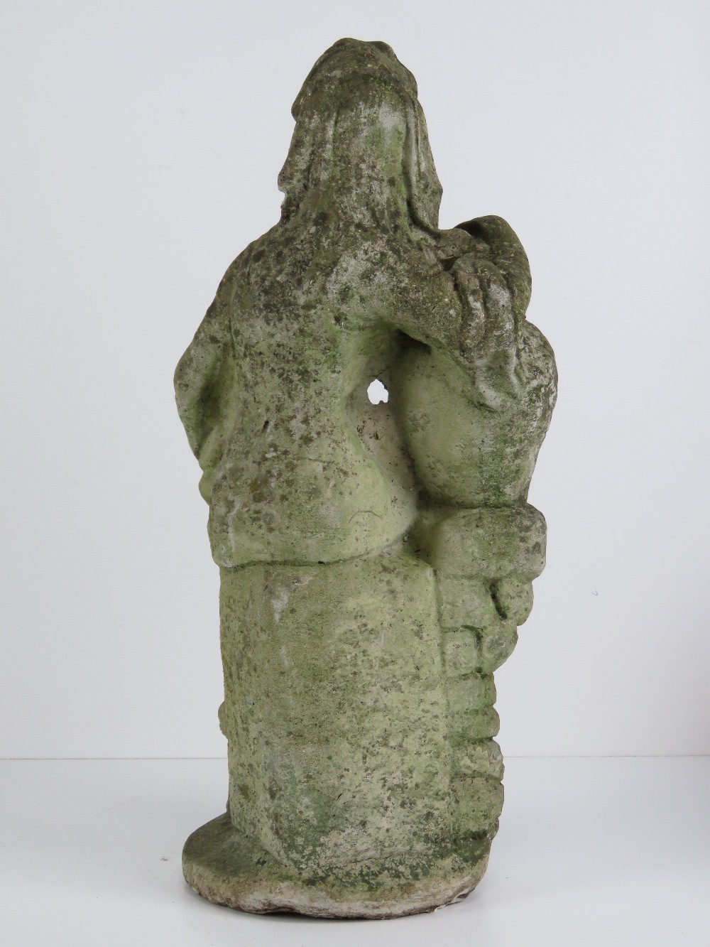 A precast stone garden ornament figurine 47cm high. Seated female with urn. - Image 3 of 3