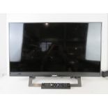 A 32" LCD Sony Bravia TV (2017 model) with remote.