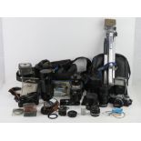 A quantity of camera equipment including Olympus OM4 and OM10 cameras, with Winder 2 and booklet,