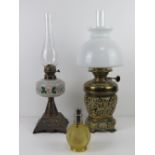 Two brass oil lamps; one having clear glass chimney and replacement milk glass shade,