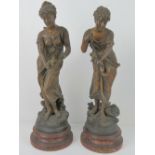 A pair of classical style female sculptures being 'Amitie' and 'Printenps',