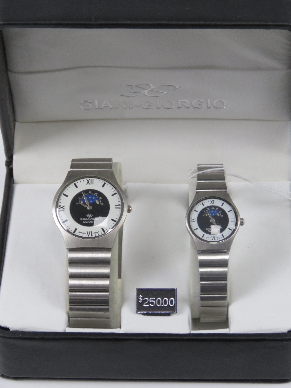 A 'His and Hers' stainless steel gents wristwatch and ladies wristwatch set, in presentation box.