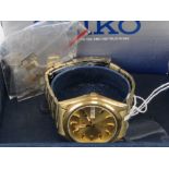 A Seiko 5 stainless steel gents wristwatch with box and papers,