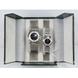 A 'His and Hers' stainless steel gents wristwatch and ladies wristwatch set, in presentation box.