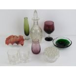A cut glass decanter with stopper together with an ovalaide glass frilled dish,