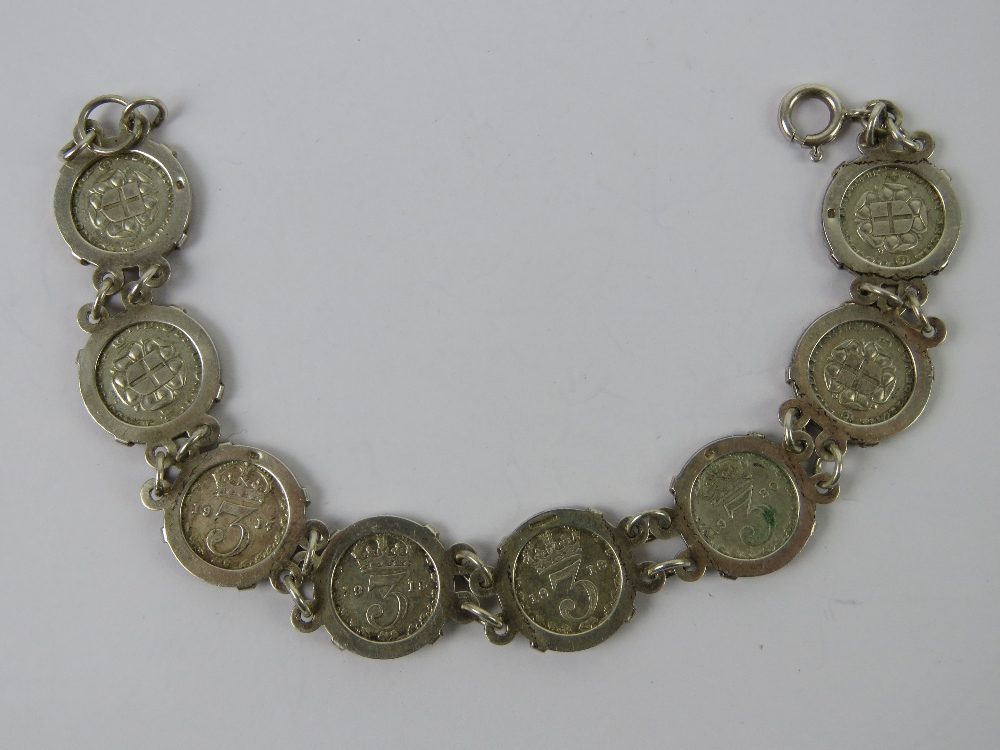 A 925 silver bracelet set with eight threepence coins 1917 - 194(0?), 19.5cm in length, 19.3g. - Image 2 of 5