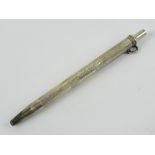 A Sterling silver chatelaine pen, having push top and being unengraved,